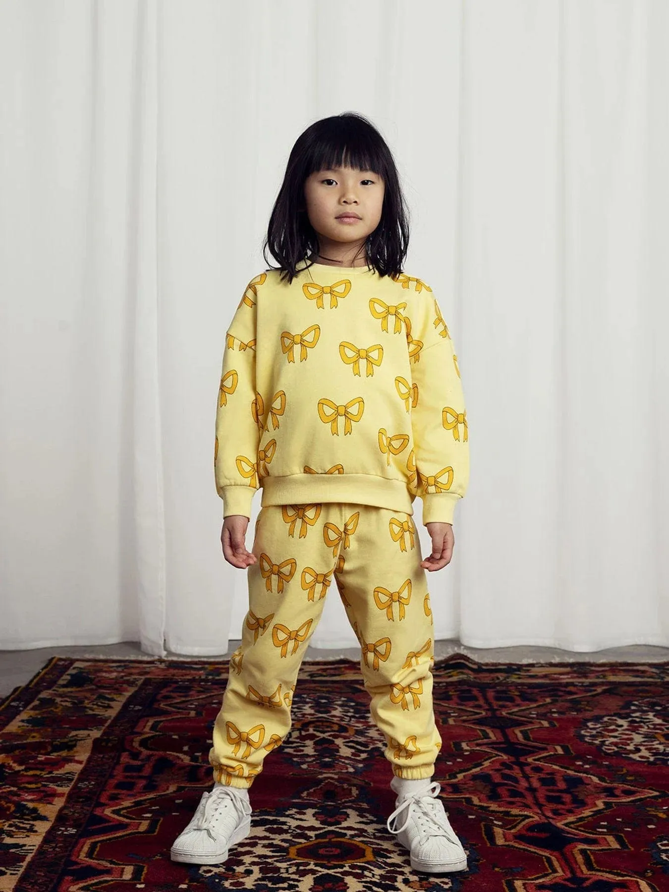 Mini Rodini Girls Bow Joggers in Yellow