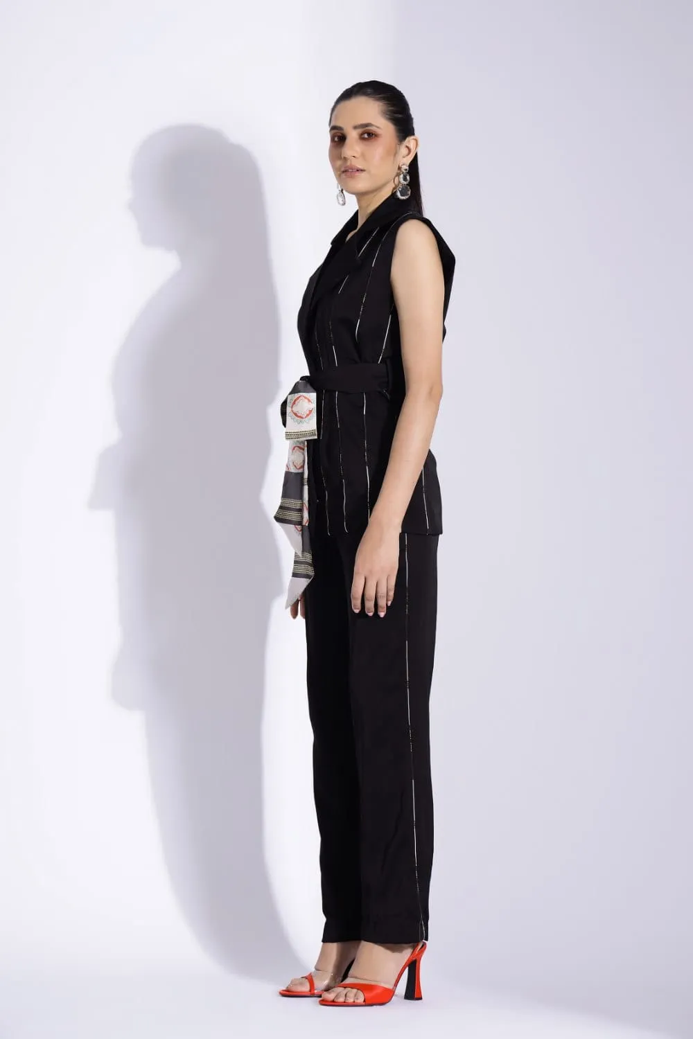 SLEEVELESS BELTED JACKET AND TAPERED PANTS